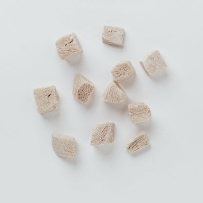 Freeze-dried chicken on a white background
